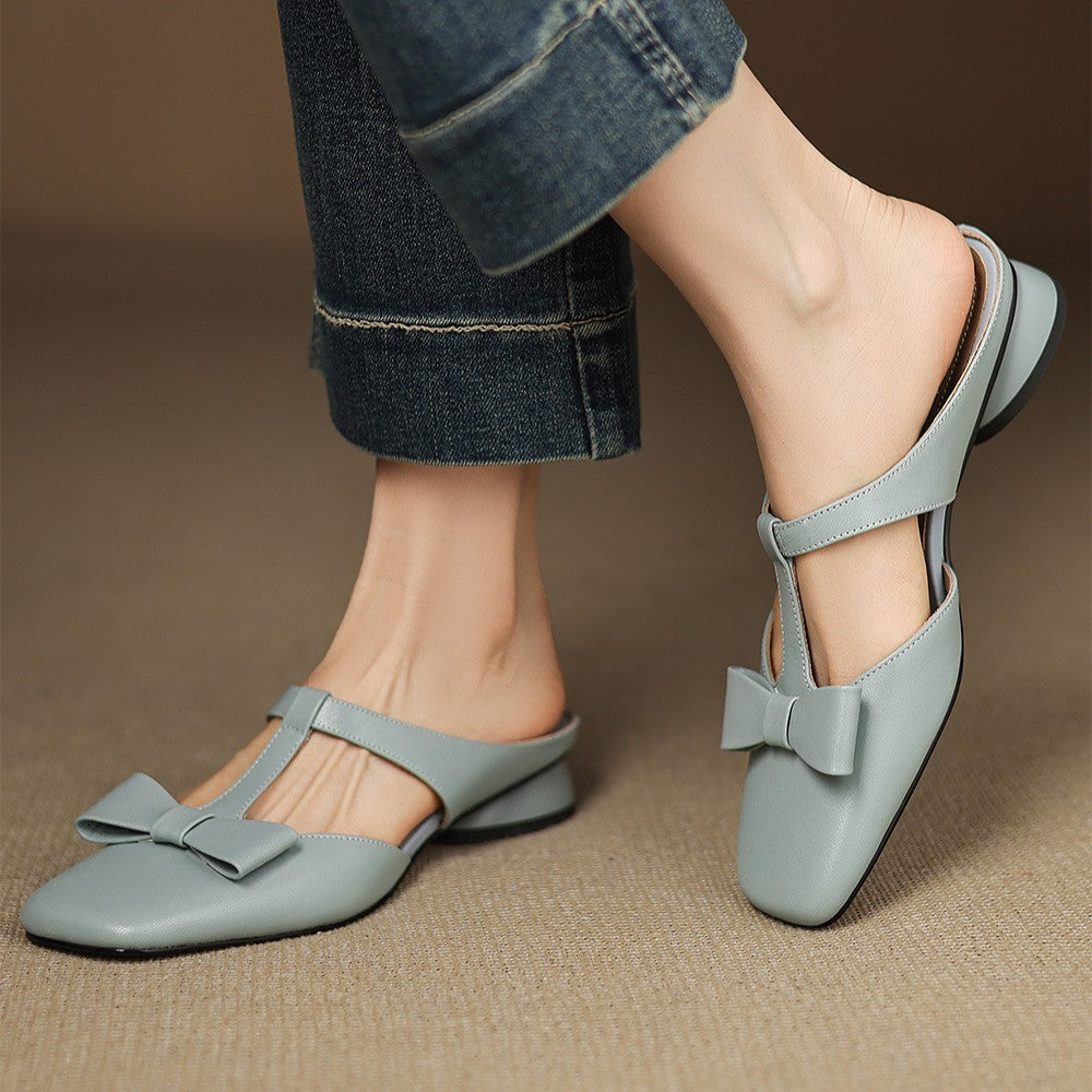 Soft Ivory lambskin heeled mules, angled studio shot