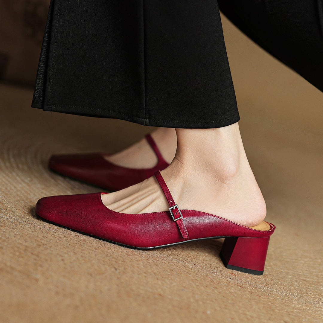 Women's square-toe leather block mules shown as a pair