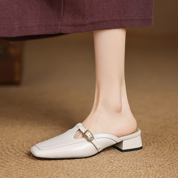 Close-up of sculpted heel on Edith leather mules