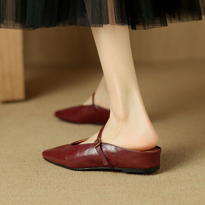 Leather flat mule, back view showing the low-profile sole