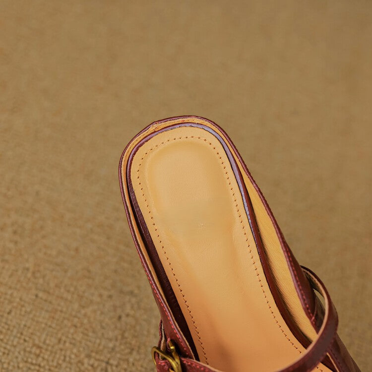 Strap leather heeled mules styled with tailored trousers