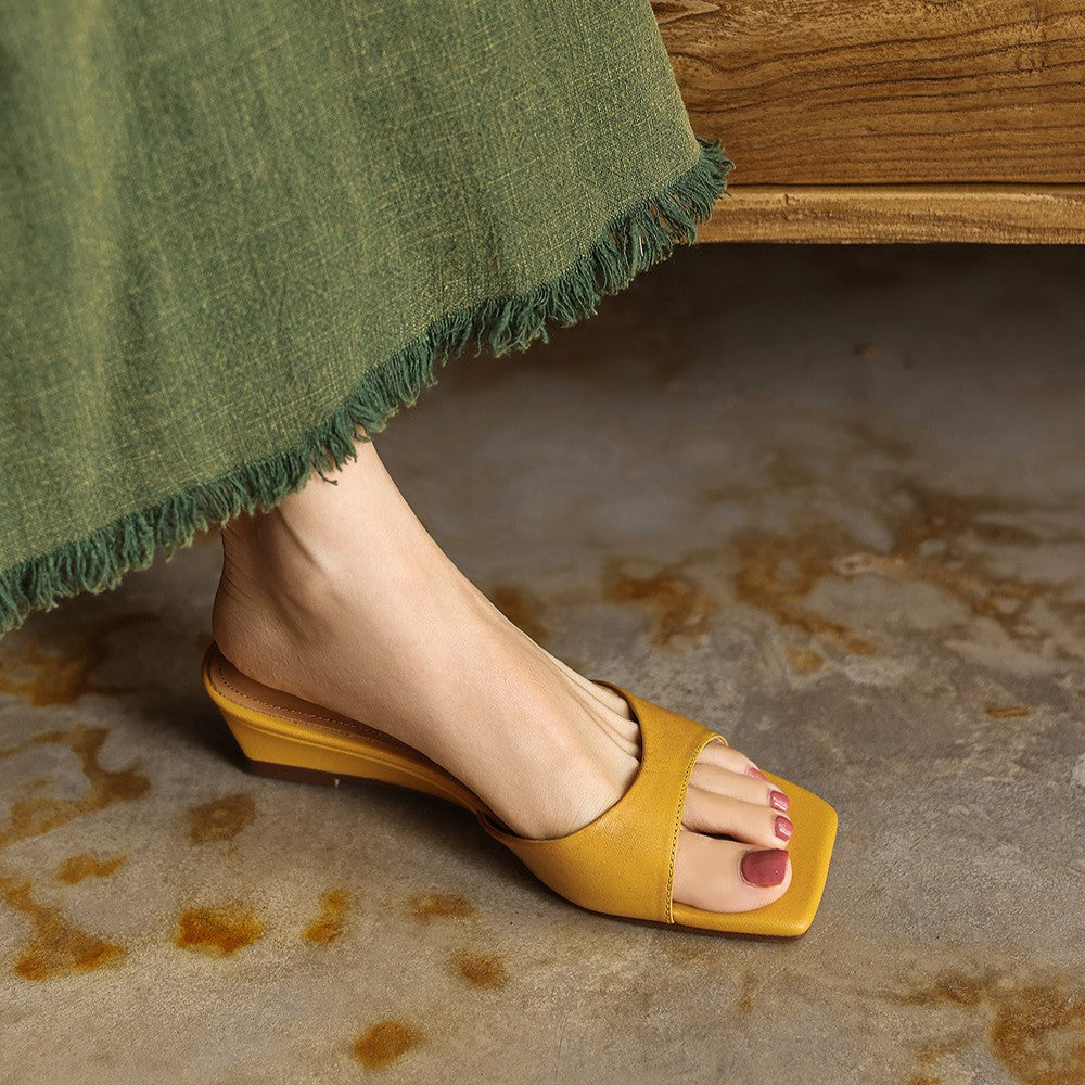 Warm Ochre leather wedge mule with square open toe, three-quarter view