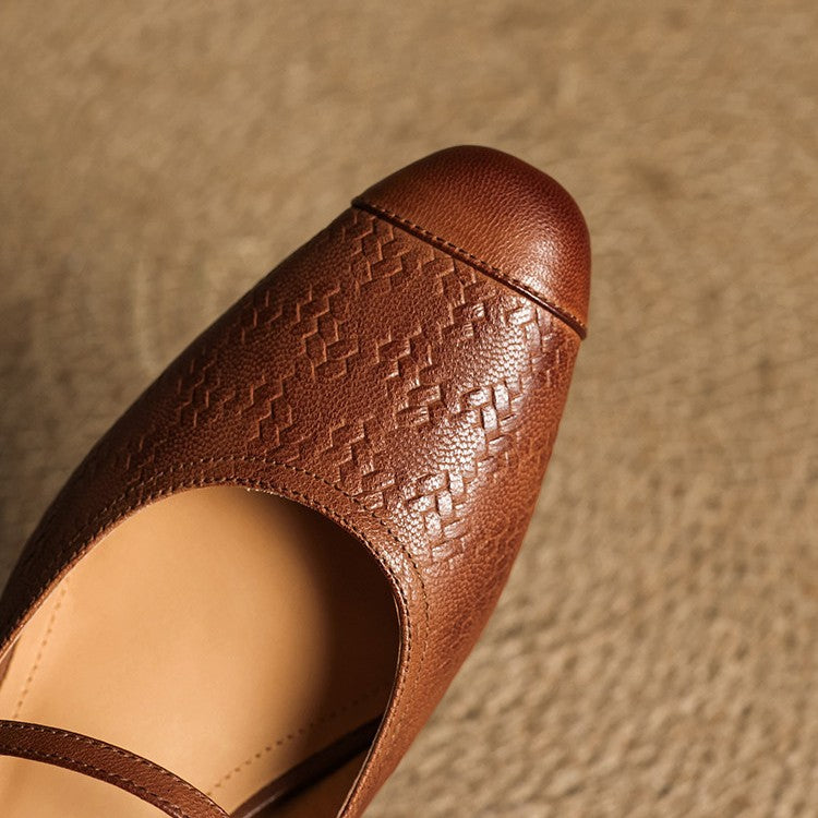 Cecilia heeled mules worn with tailored trousers