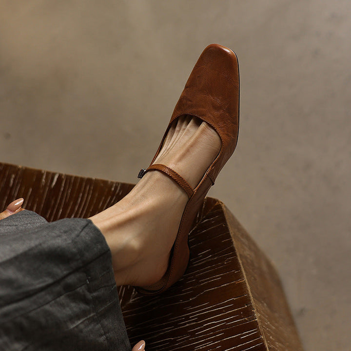 Close-up of lambskin leather on a square-toe heeled mule