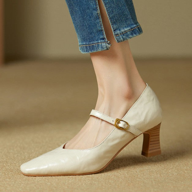 Ivory White Patrice pumps photographed from above