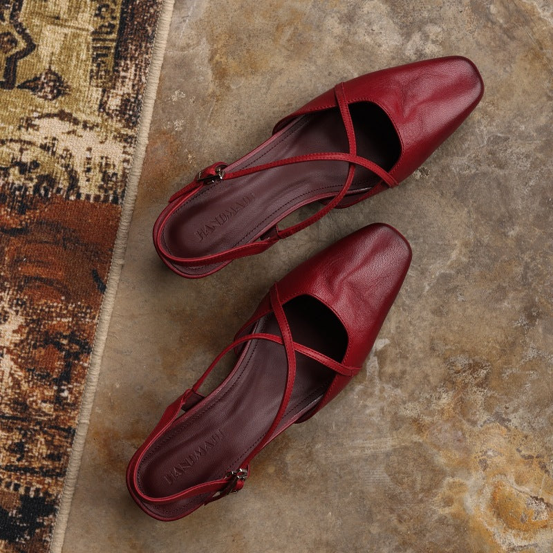Top-down view of a square-toe cross-strap leather slingback