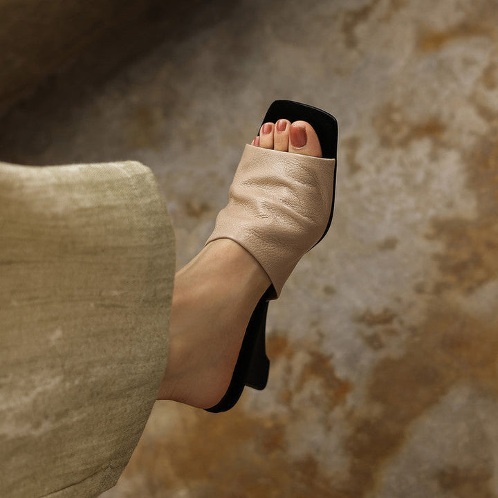 Close-up of sculpted heel on Sylvia leather sandal mules
