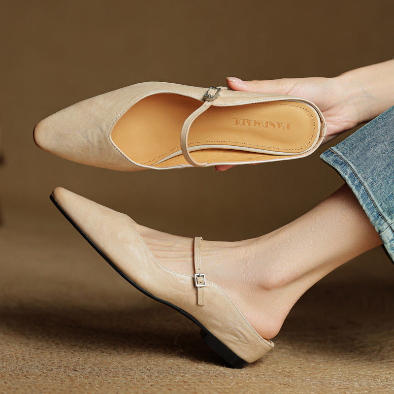 Sand Beige lambskin flat mule with round toe, three-quarter view