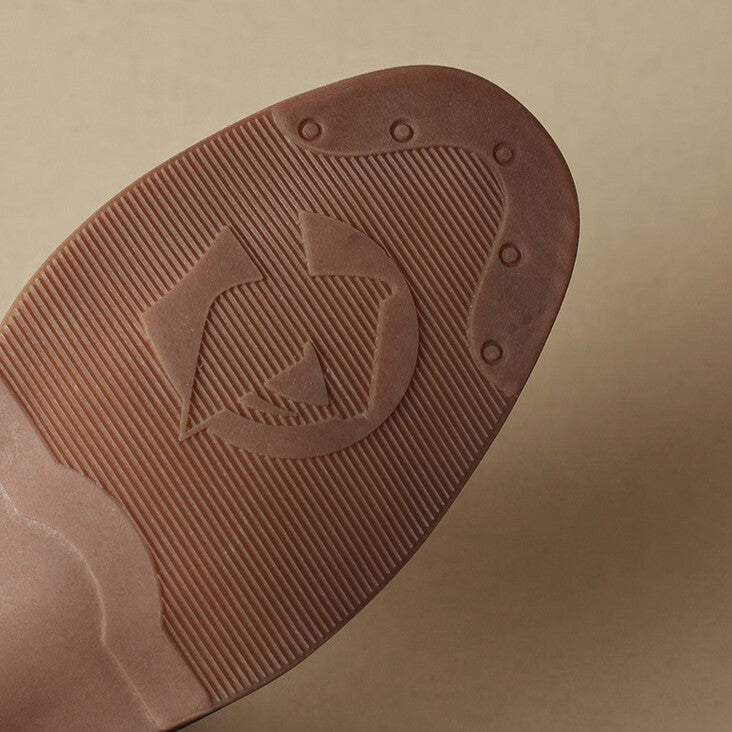 Close-up of block heel on Geraldine leather T-bar heels