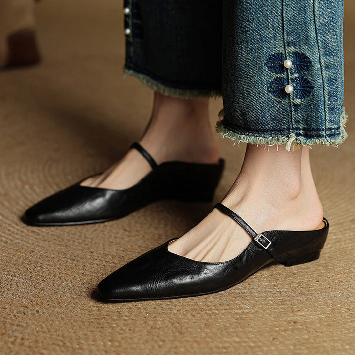 Wine Red lambskin flat mules, angled studio shot