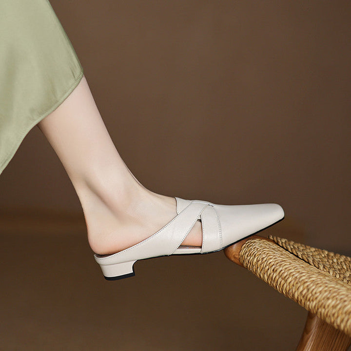 Onyx Black Carmen mules photographed from above