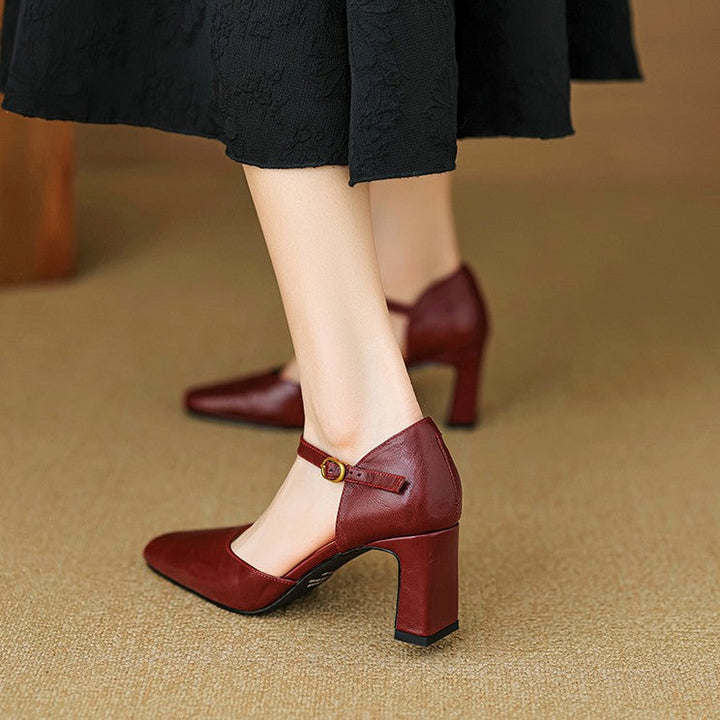 Espresso Noir lambskin d'Orsay heel, side view of 2.75-inch block heel