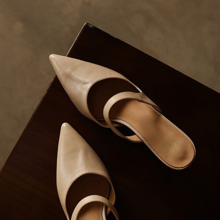Bare Almond Sabine mules photographed from above