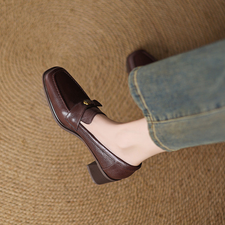 Sylvie loafer pumps, close-up of floral metal accent