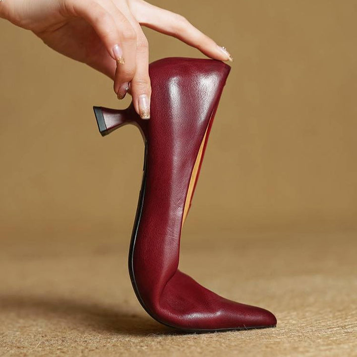 Women's pointed leather kitten heels, front view