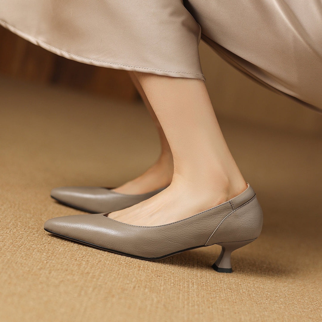 Ivory Cream leather kitten-heel pump, side view of 2-inch heel
