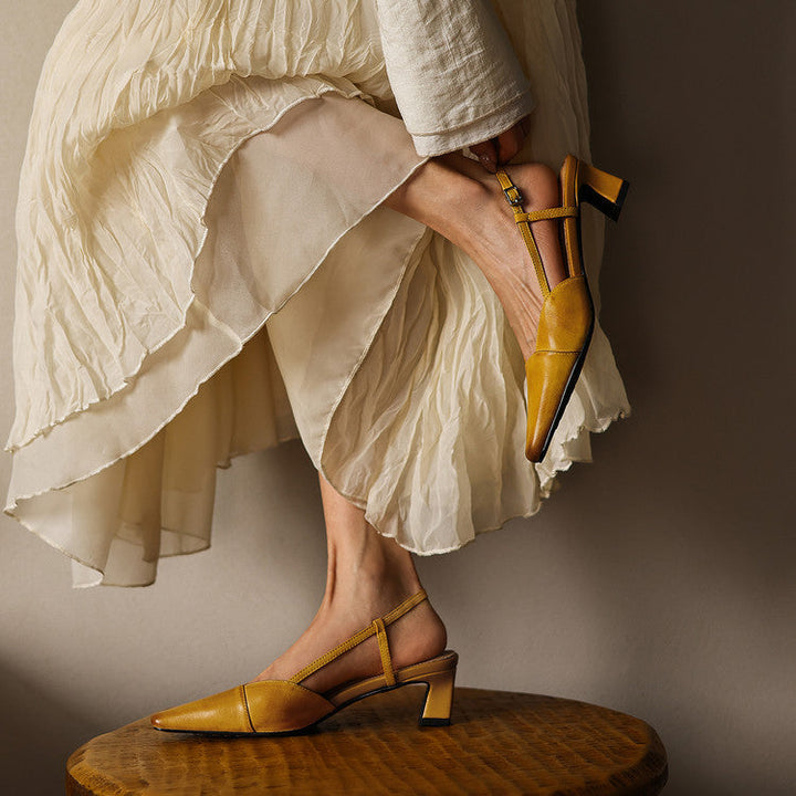 Leather slingback pump, back view showing the adjustable strap