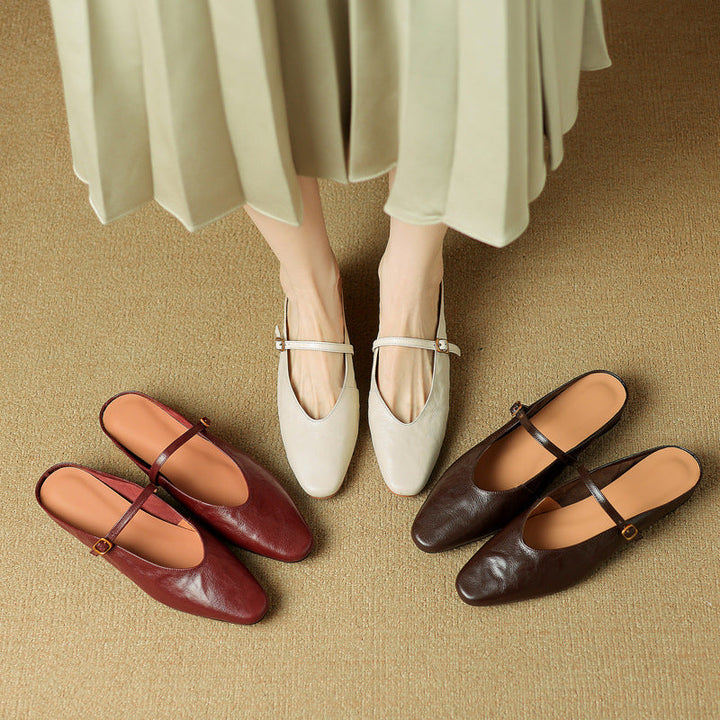 Leather flat mules styled with ankle trousers