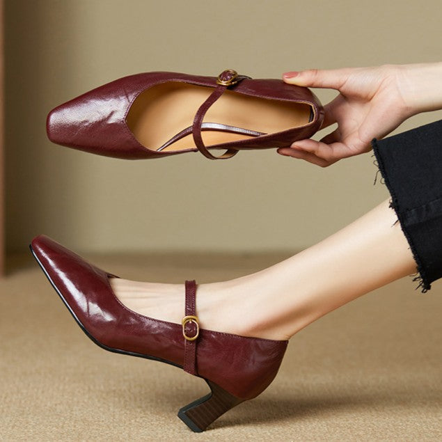 Classic Black leather Mary-Jane pumps, angled studio shot