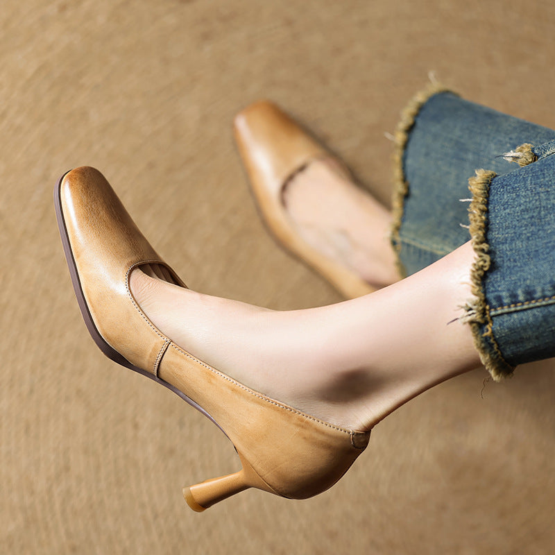 Espresso Brown leather pump, side view of mid heel