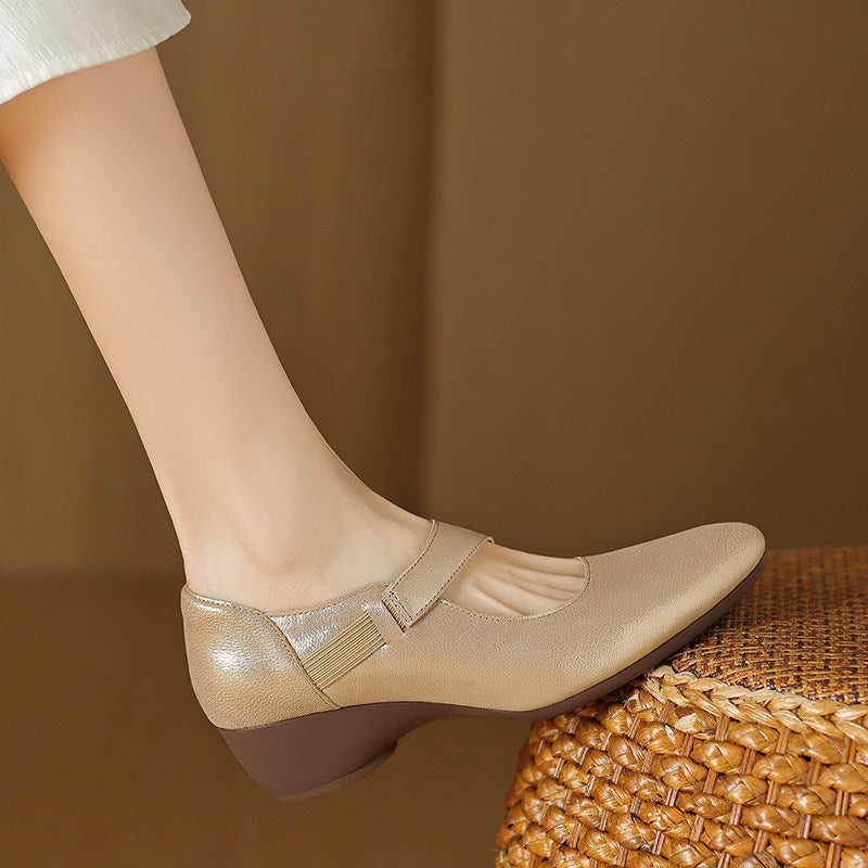 Suzanne wedges, close-up of elastic Mary-Jane strap