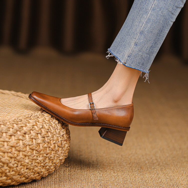 Women's square-toe leather Mary-Jane heels shown as a pair