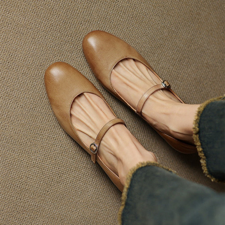 Close-up of cowhide leather and strap on a pointed block heel