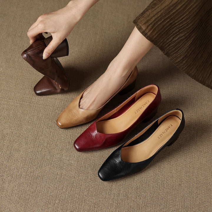 Women's square-toe leather pumps shown as a pair