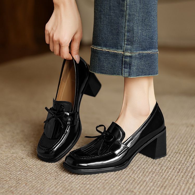 Tabitha loafer pumps worn with tailored trousers