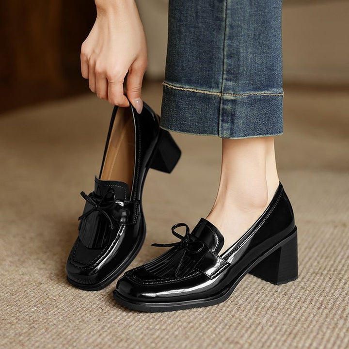 Tabitha loafer pumps worn with tailored trousers