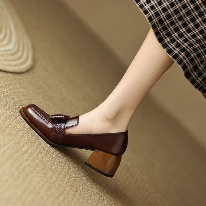 Bow leather loafer pump, back view showing the 2-inch block heel