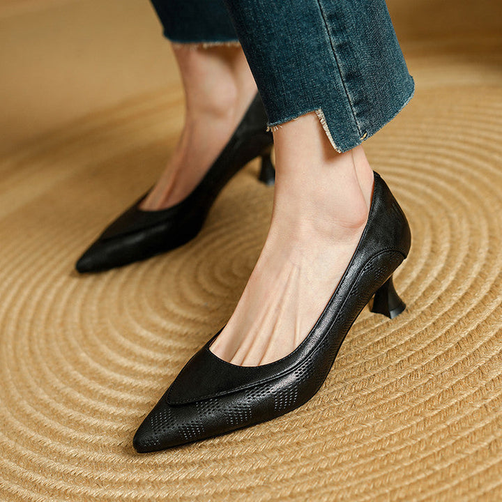 Pointed leather heel, angled heel view