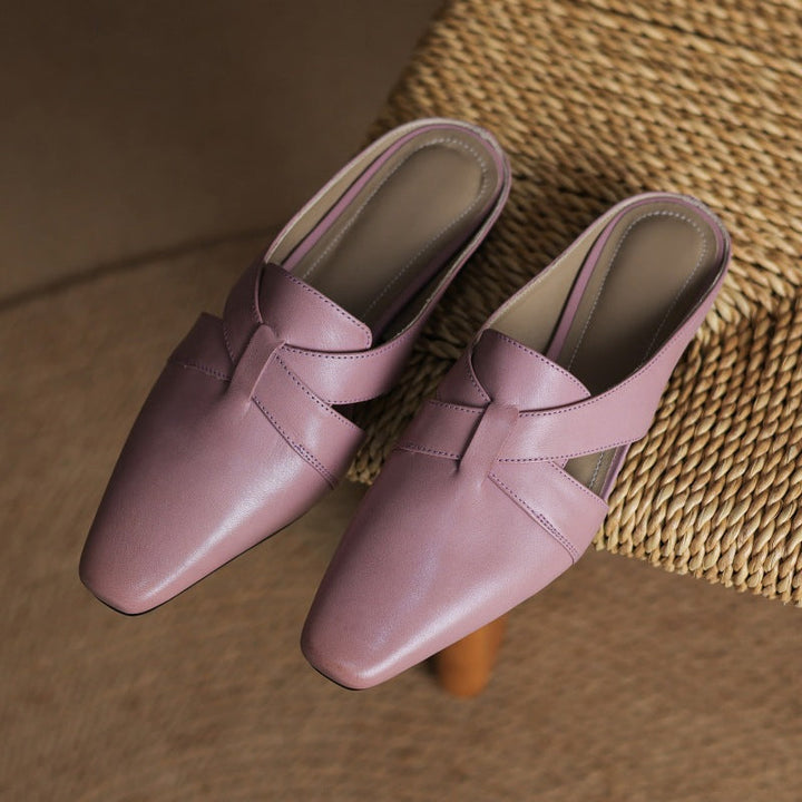 Carmen mules, detail of open-back profile