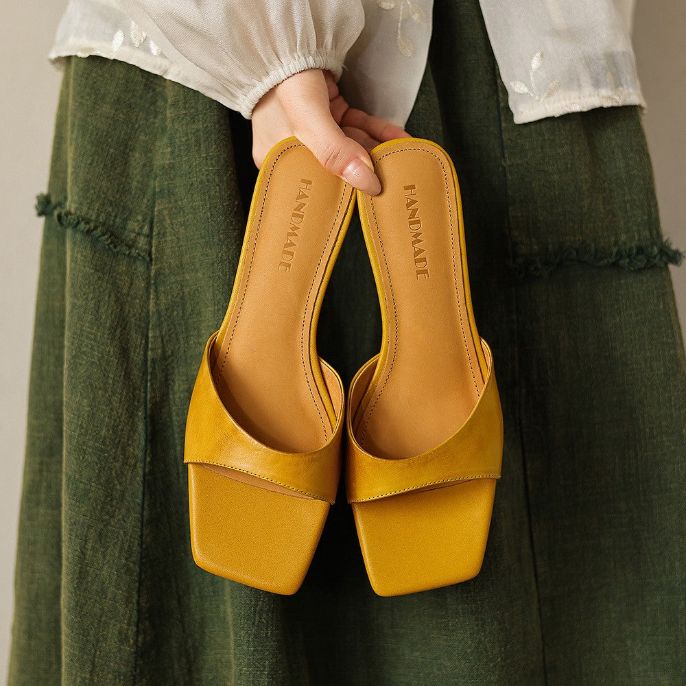 Bernadette wedge mules, detail of leather upper