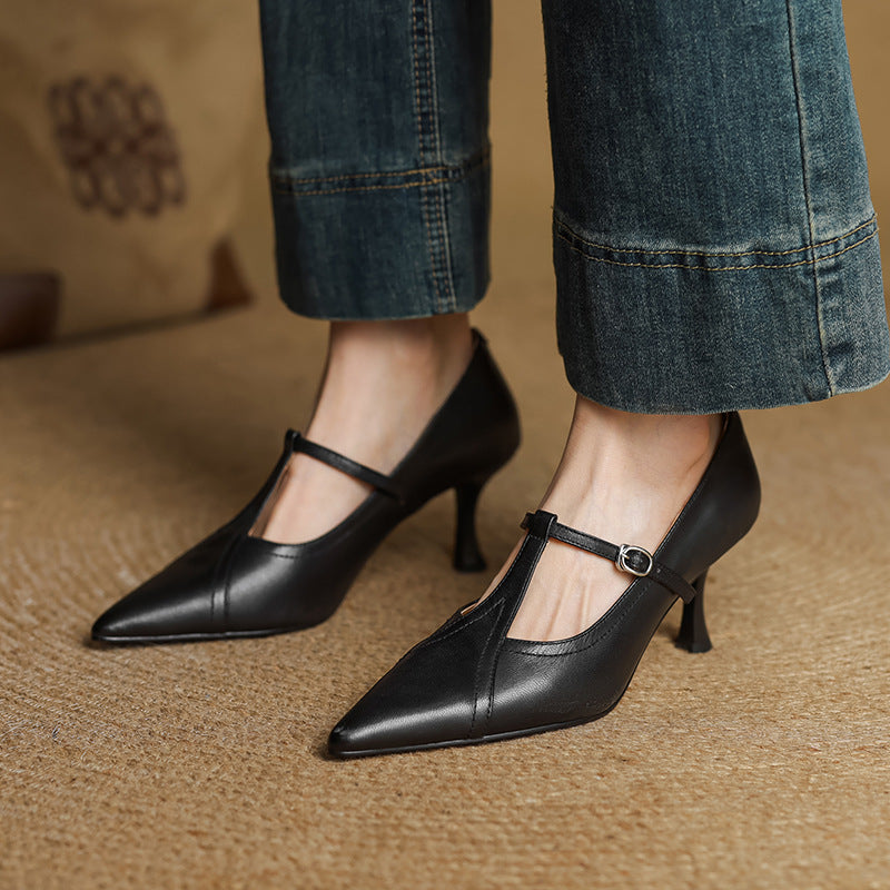 Evelyn T-strap pumps worn with a dress