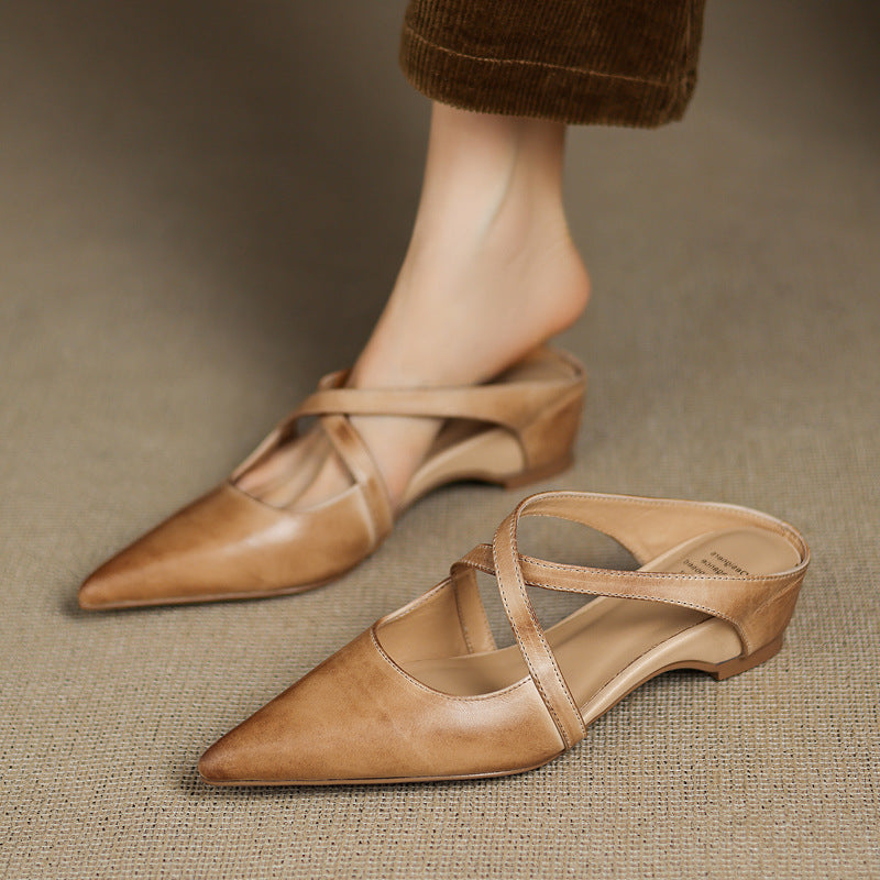 Ebony Black leather mules, angled studio shot