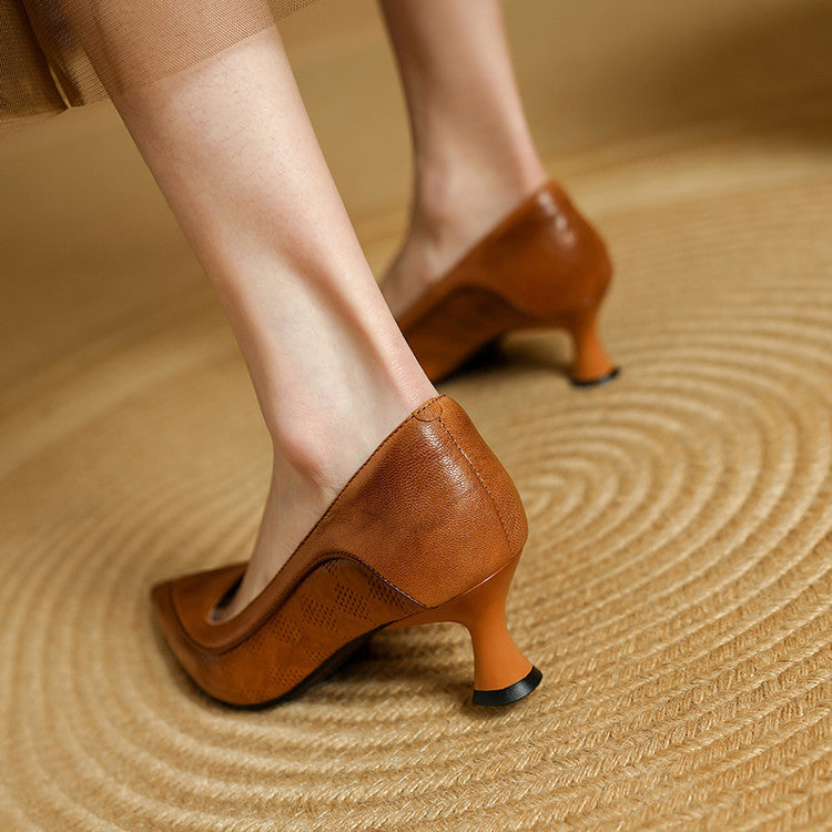 Top-down view of a pointed-toe leather heel