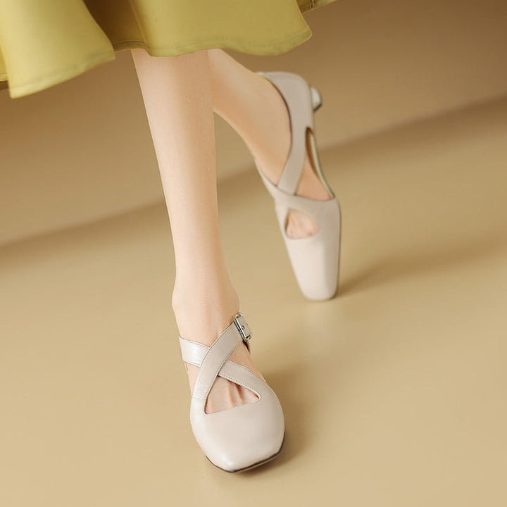 Close-up of block heel on Ramona leather d'Orsay heels