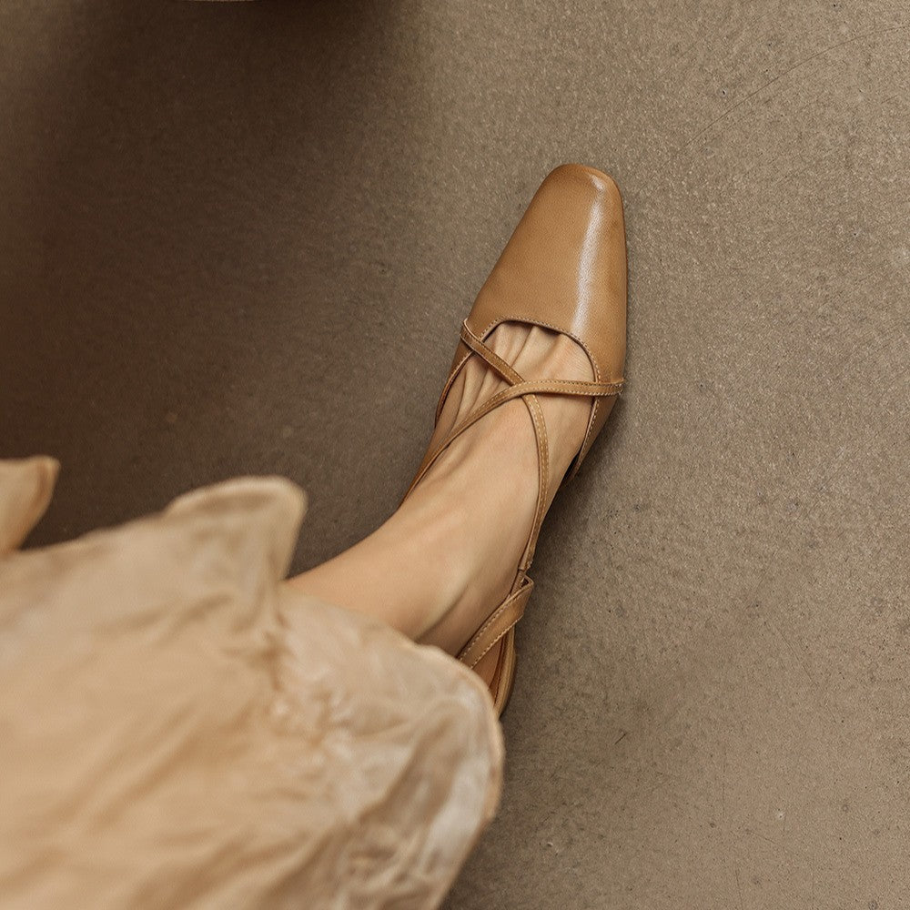 Cushioned leather insole of a cross-strap slingback