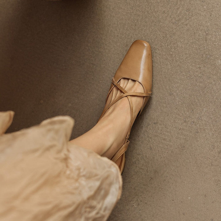 Cushioned leather insole of a cross-strap slingback
