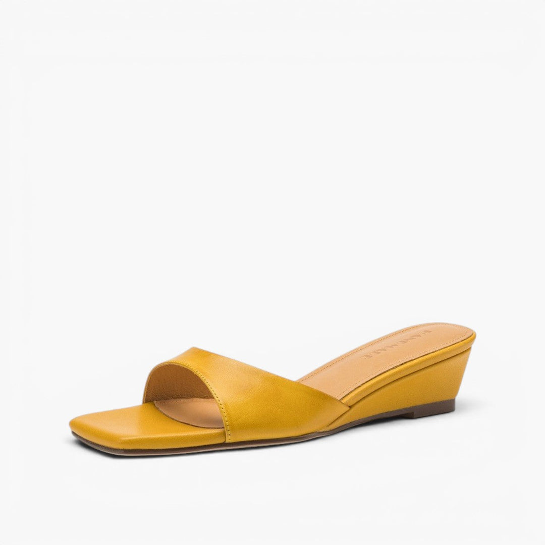 Bernadette square-toe leather wedge mules in Warm Ochre, side profile
