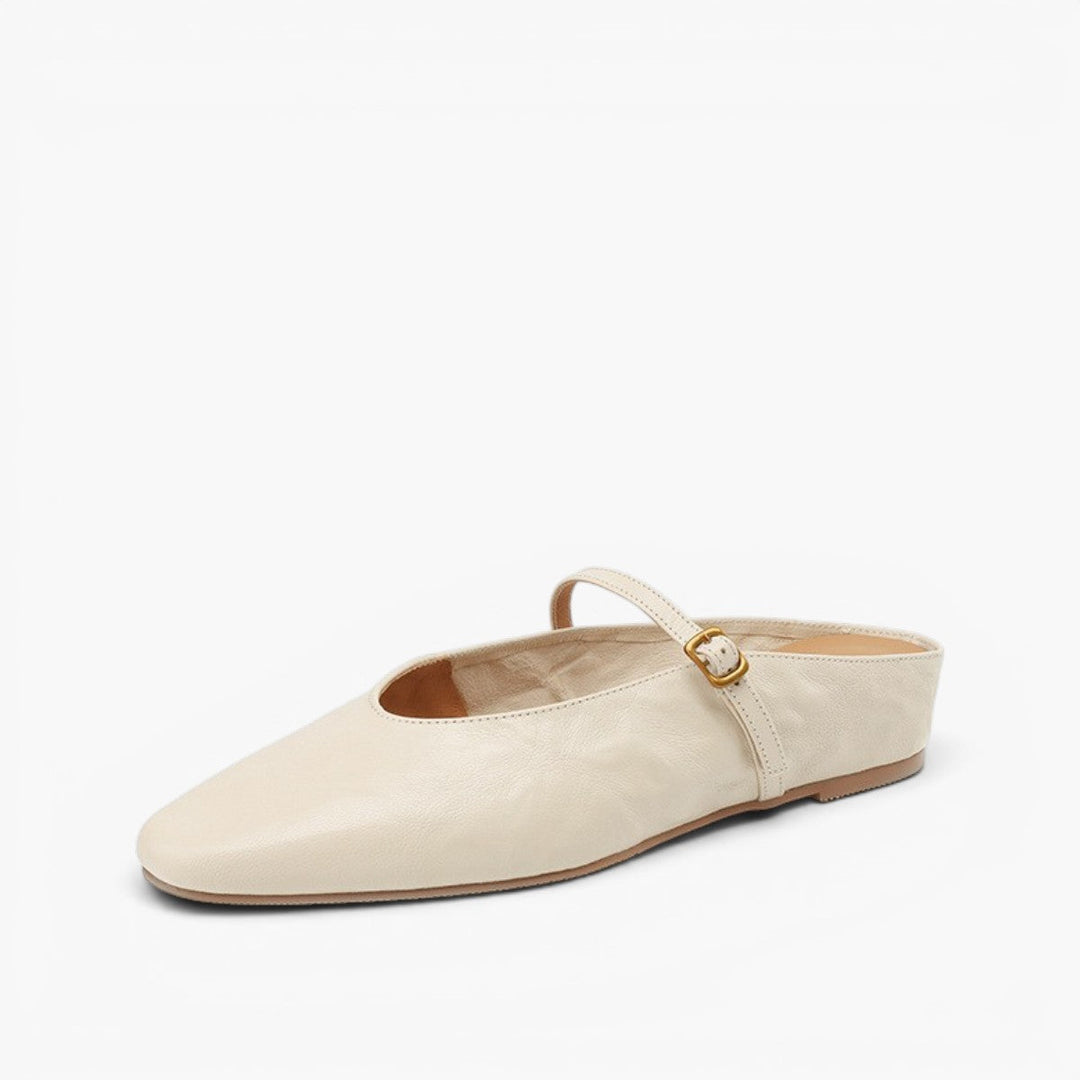 Strap leather flat mule, angled side view