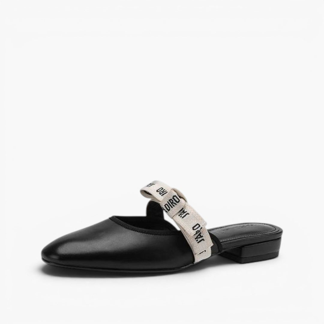 Adele bow leather heeled mules in Noir Black, side profile
