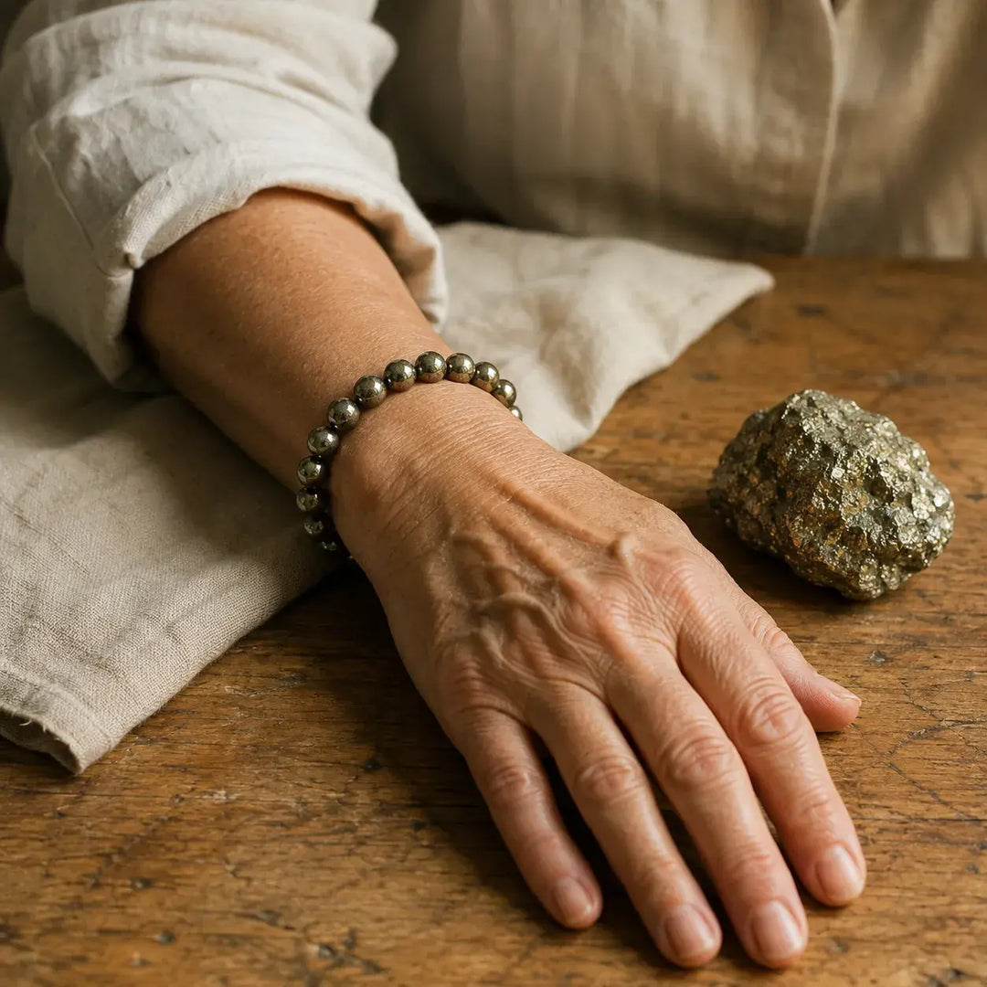 Pyrite bracelet on wrist for confidence and abundance