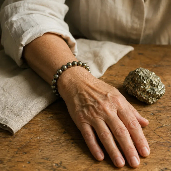 Pyrite bracelet on wrist for confidence and abundance