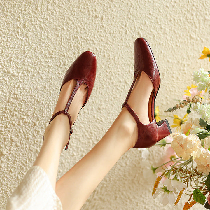 Leather T-strap heel, back view showing the open back