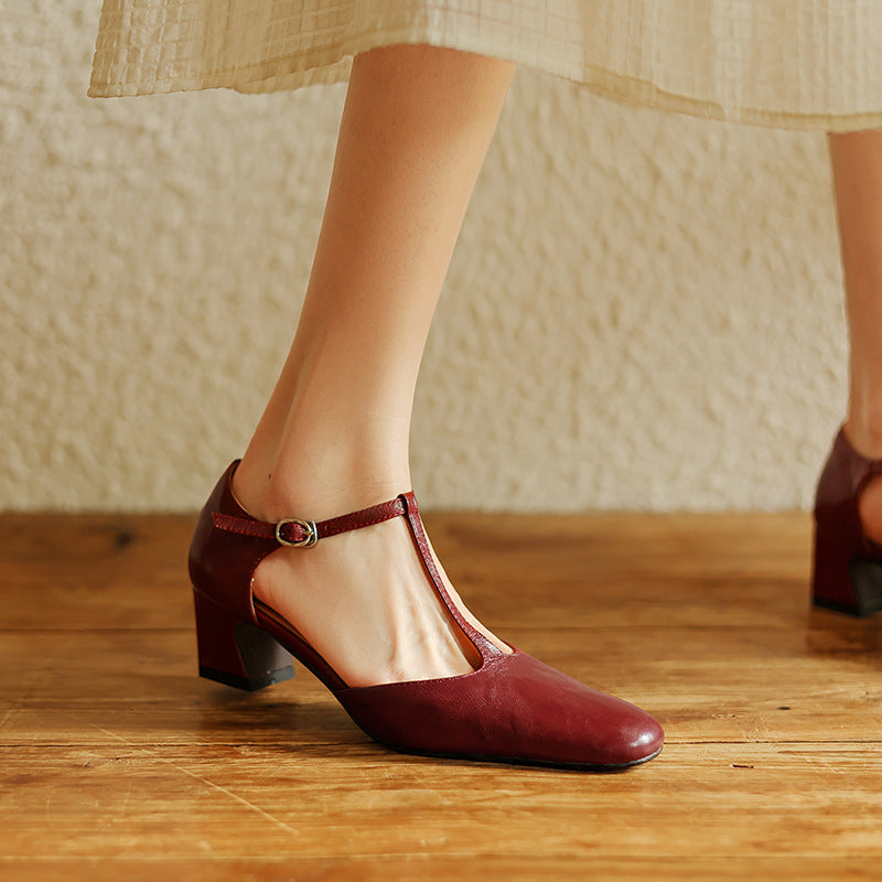 Close-up of genuine leather and T-strap on an open-back heel