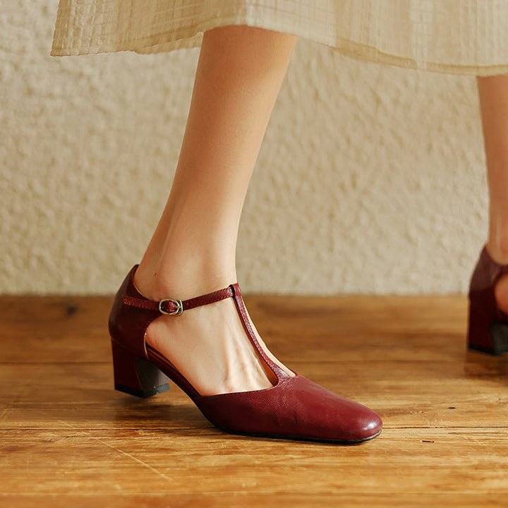 Close-up of genuine leather and T-strap on an open-back heel