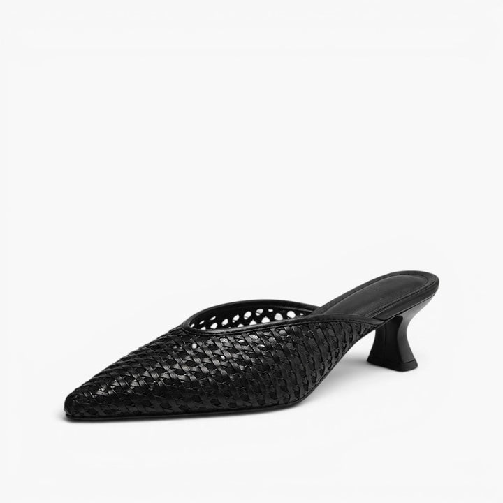 Top-down view of a pointed woven leather mule