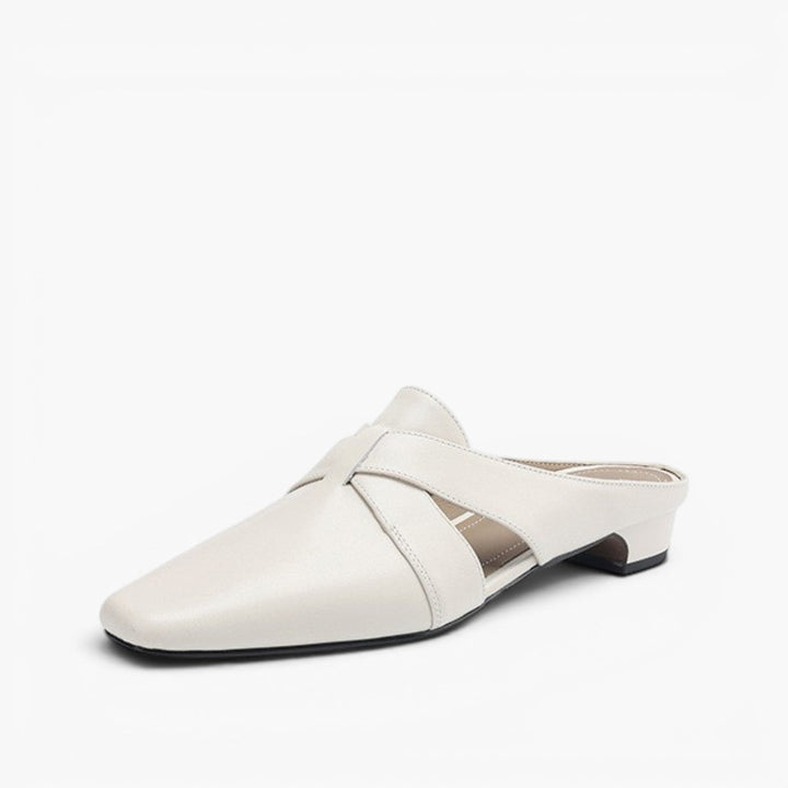 Onyx Black leather heeled mules, angled studio shot